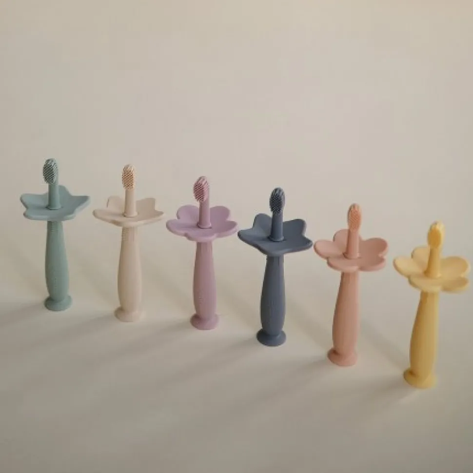 Cepillo de dientes aprendizaje mushie pink
